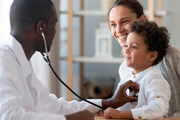 Doctor checking the child patient